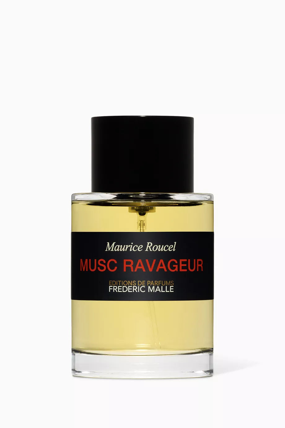 A cylindrical clear glass bottle of Frederic Malle Musc Ravageur 100ml from France, featuring a red and black label with a simple black cap, shown as a product tester.