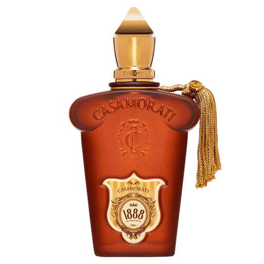 100ml frosted reddish-brown bottle with gold accents, a gold tassel, and a pointed gold crown cap.