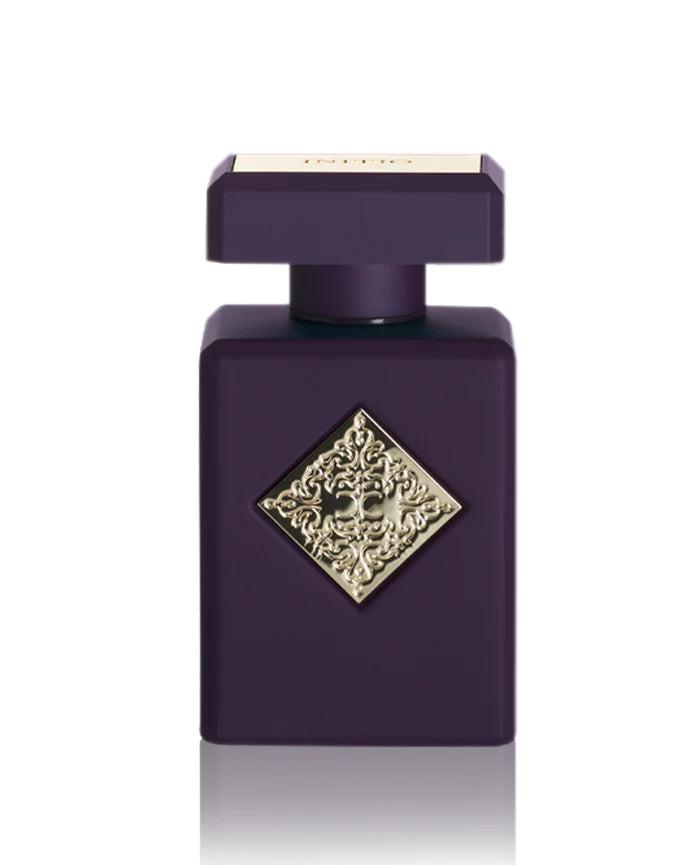 Initio Side Effect perfume. Purple perfume bottle with gold decorative cap on a white background.