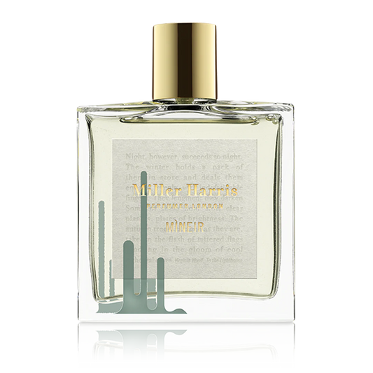 Mìneir by Miller Harris perfume bottle with gold cap on a white background