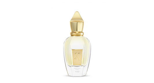 Perfume bottle with gold cap and label on a white background. The perfume is Nio by Xerjoff