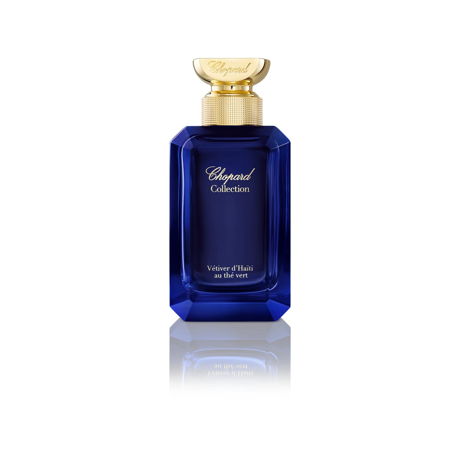 Vetiver d'Haïti au Thé Vert by Chopard perfume bottle with blue glass and gold cap on a white background