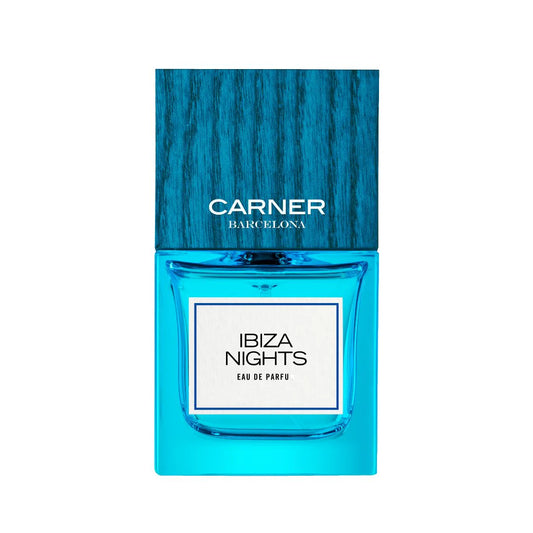 100ml clear glass bottle of Carner Barcelona Ibiza Nights with a white label and a large wooden cap.
