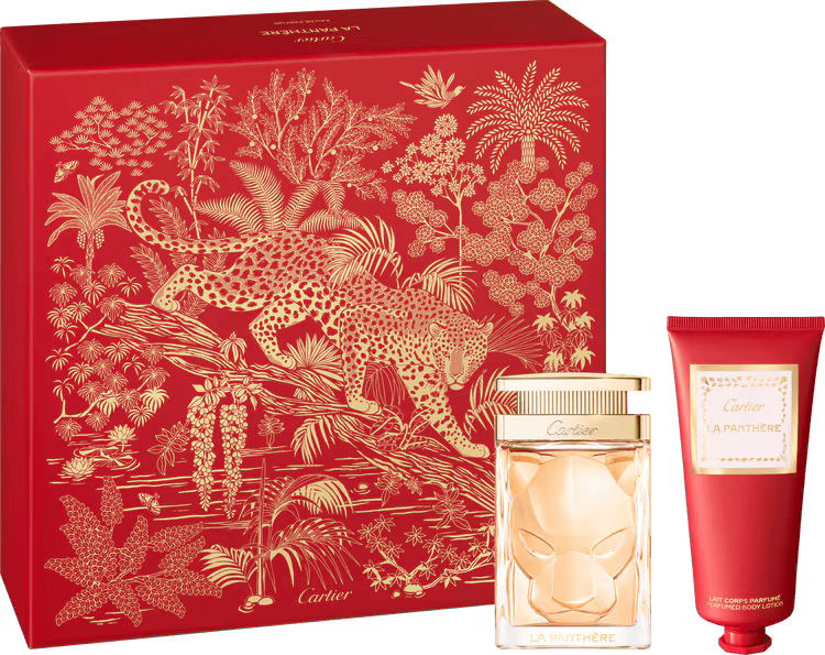 Cartier gift set with red panther-illustrated box, panther-head glass bottle, and a red lotion tube.