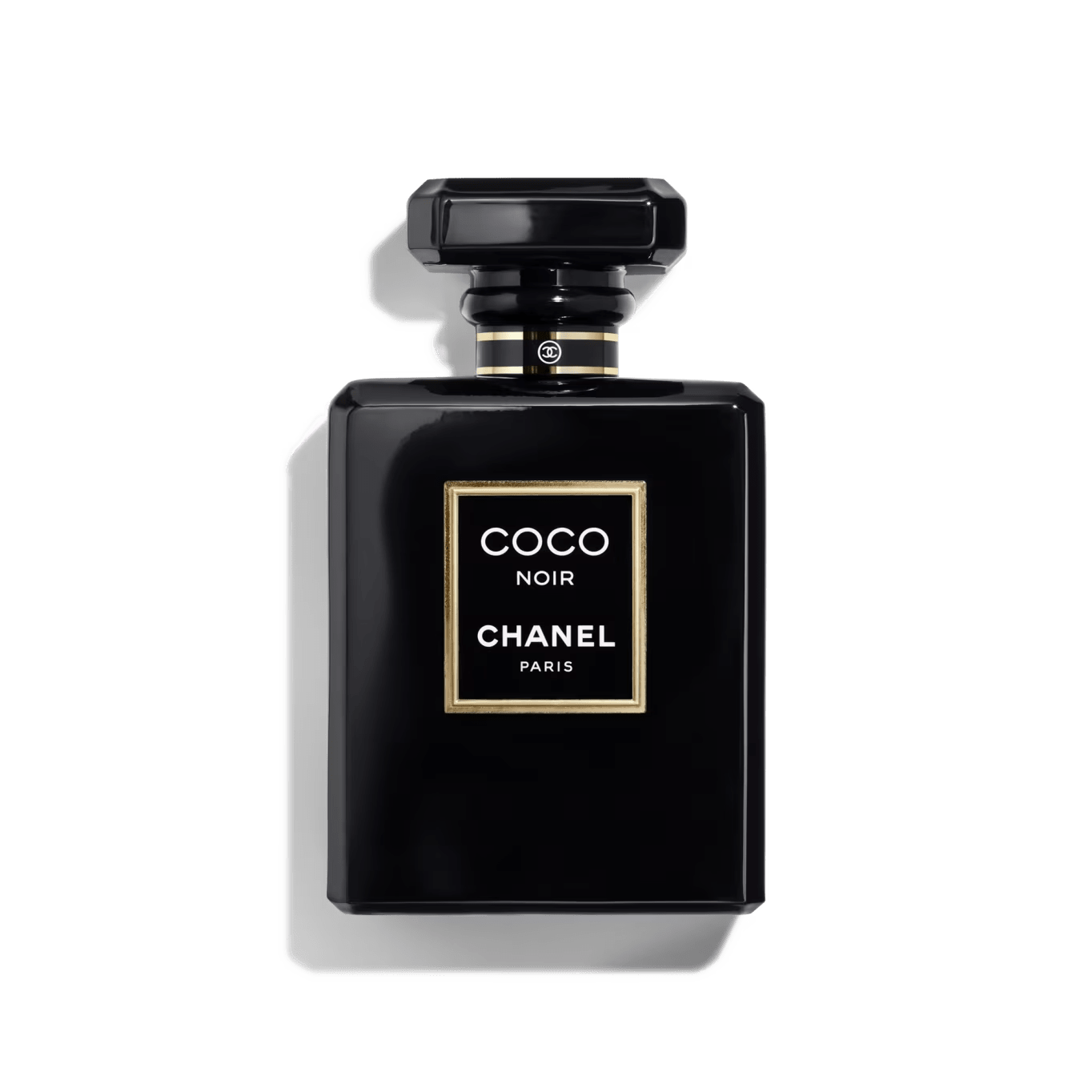 100ml opaque black rectangular Chanel bottle with a gold-bordered label and a matching black octagonal cap.