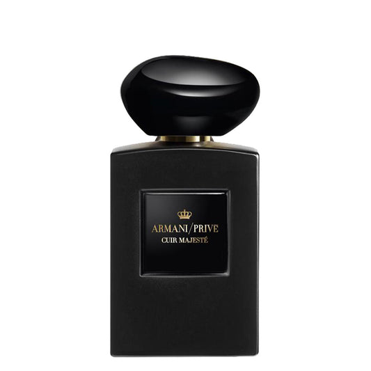 100ml opaque black rectangular bottle with a gold square label and a smooth black pebble cap.