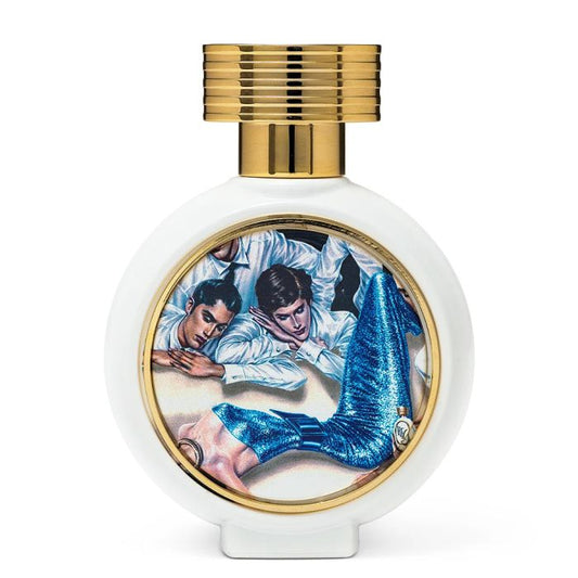 75ml circular white Haute Fragrance Company Voodoo Chic bottle with a gold ribbed cap and a detailed illustration of a reclining figure in a blue dress.