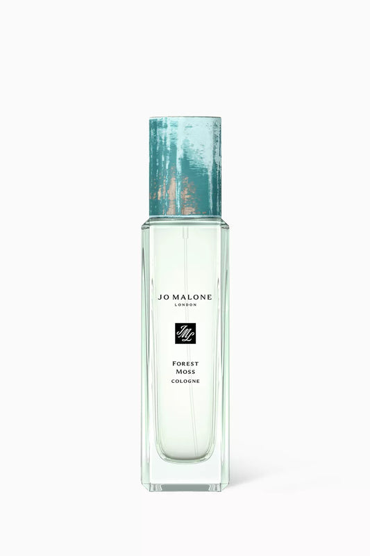 30ml slender Jo Malone Forest Moss bottle with a textured teal and copper cap and a minimal white label.