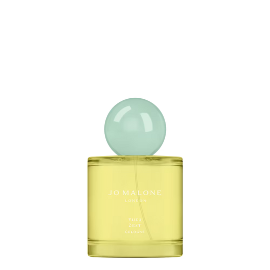 50ml cylindrical Jo Malone Yuzu Zest bottle with a large spherical light yellow cap and white text.