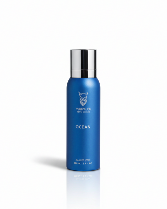 A 100ml vibrant blue aerosol bottle of Marvalea Ocean All Over Spray from the Middle East, featuring a silver brand logo and a silver cap.