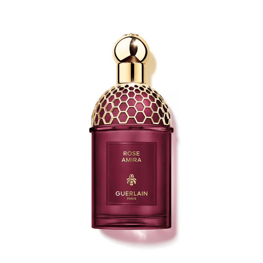 125ml deep burgundy Guerlain bottle with a gold honeycomb mesh dome and a spherical gold cap.