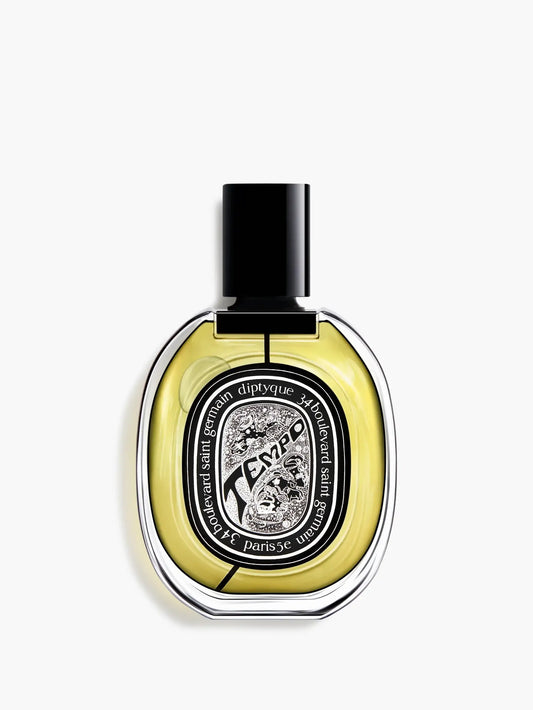 75ml oval glass bottle with yellow liquid, a black cap, and a black-and-white illustrated Diptyque label.