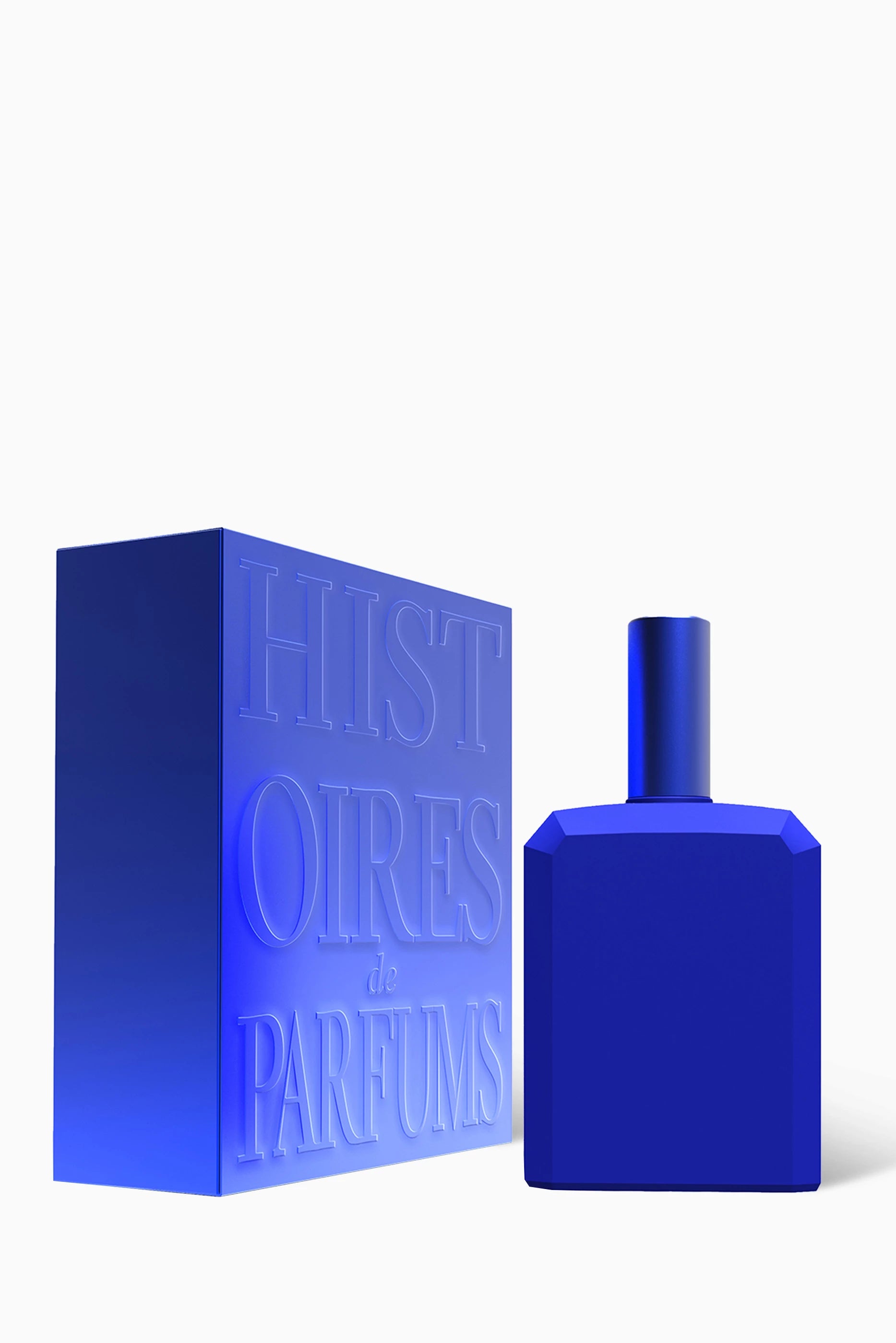 115ml opaque electric blue rectangular bottle and matching box with embossed vertical brand lettering.