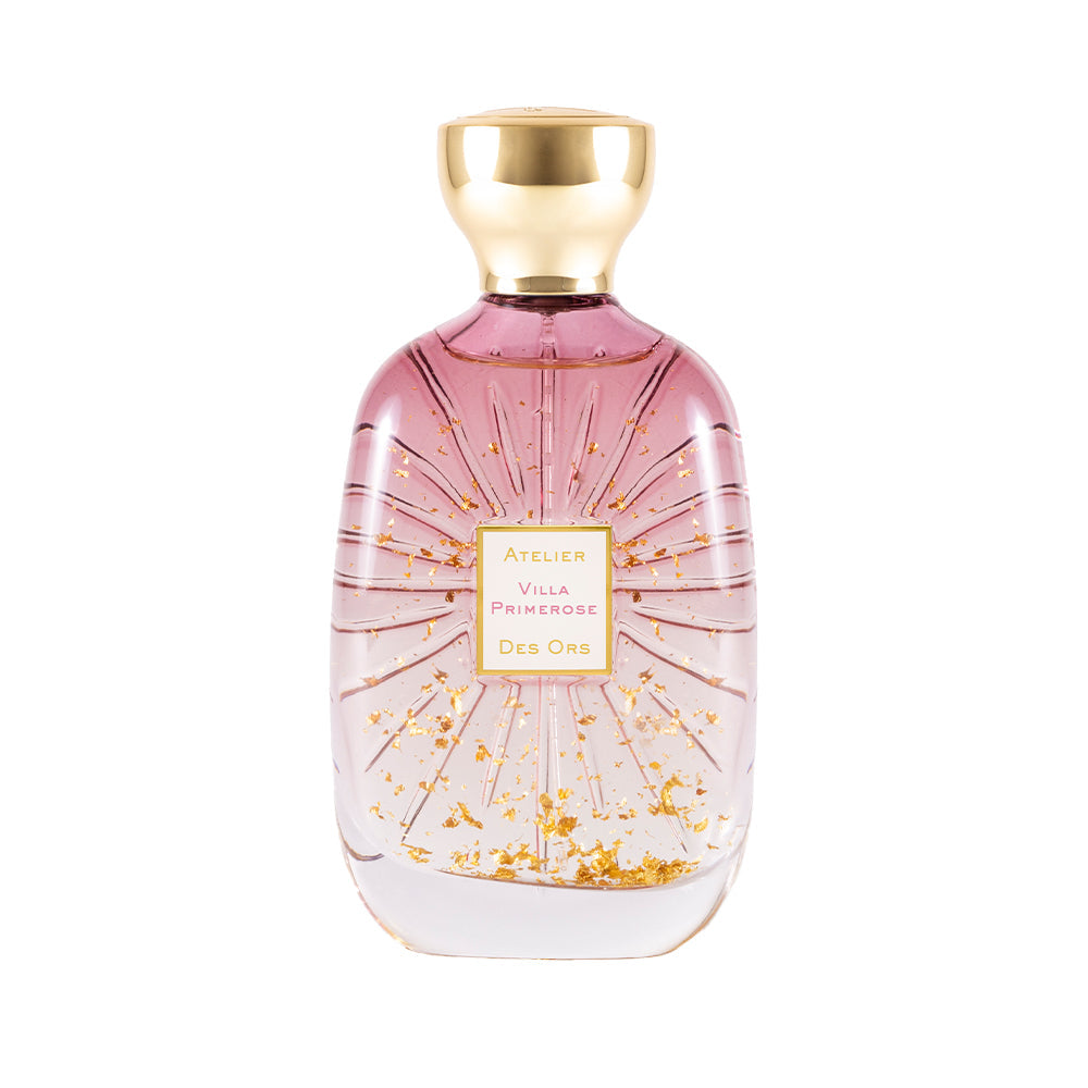 100ml curved pink glass bottle with gold leaf flakes inside, a square white label, and a gold cap.